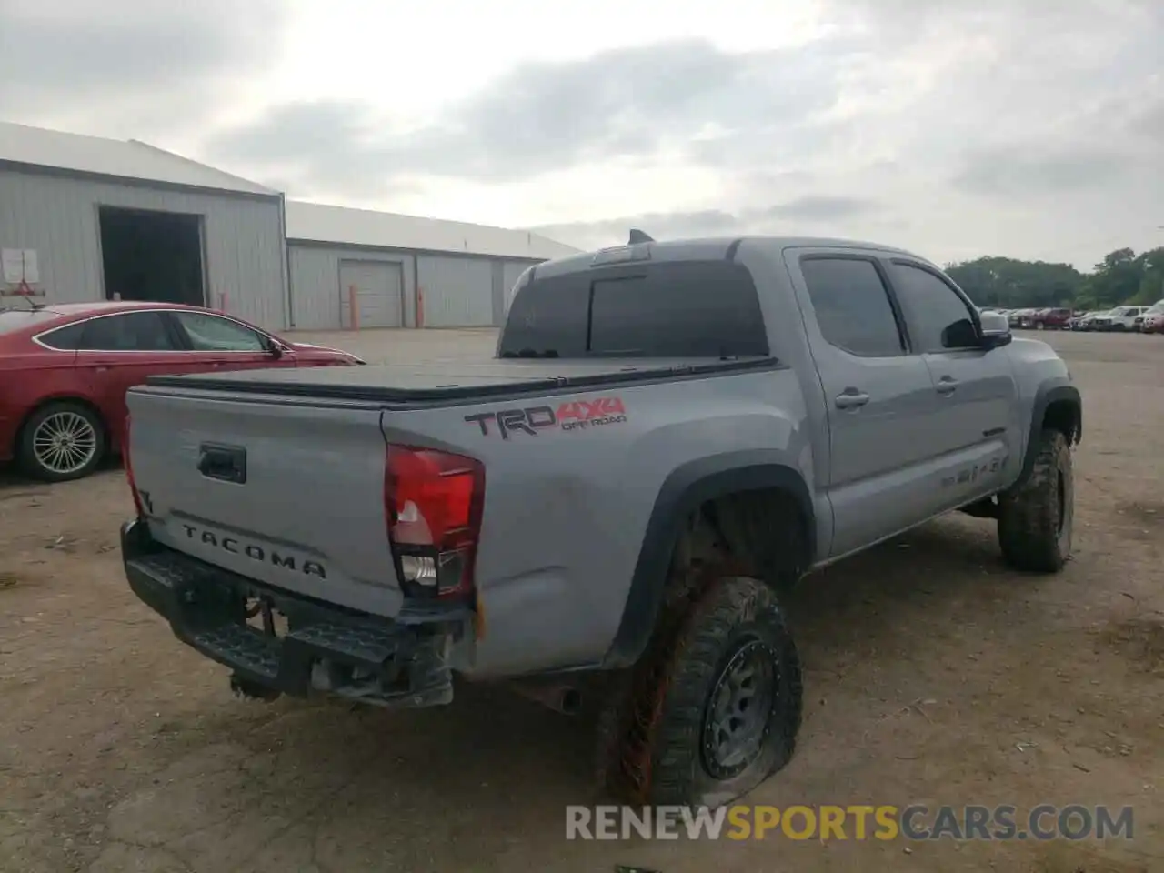 4 Photograph of a damaged car 3TMCZ5AN9KM207710 TOYOTA TACOMA 2019