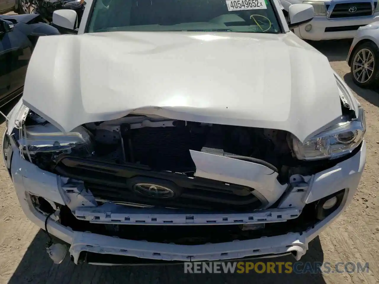 7 Photograph of a damaged car 3TMCZ5AN9KM208372 TOYOTA TACOMA 2019