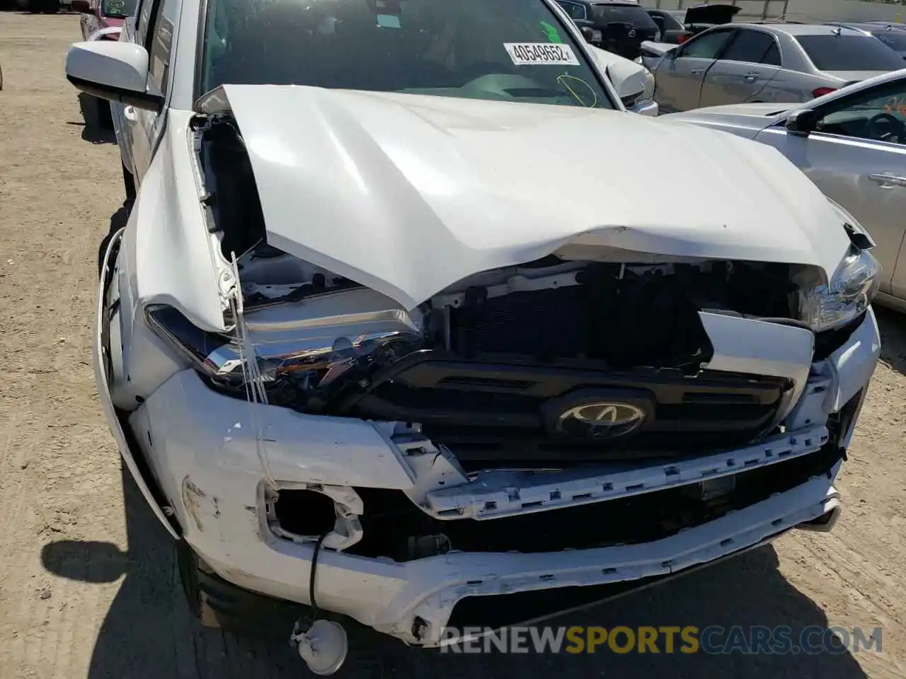 9 Photograph of a damaged car 3TMCZ5AN9KM208372 TOYOTA TACOMA 2019