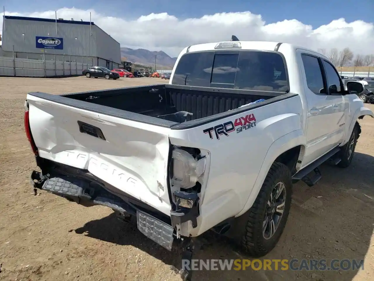 4 Photograph of a damaged car 3TMCZ5AN9KM208422 TOYOTA TACOMA 2019