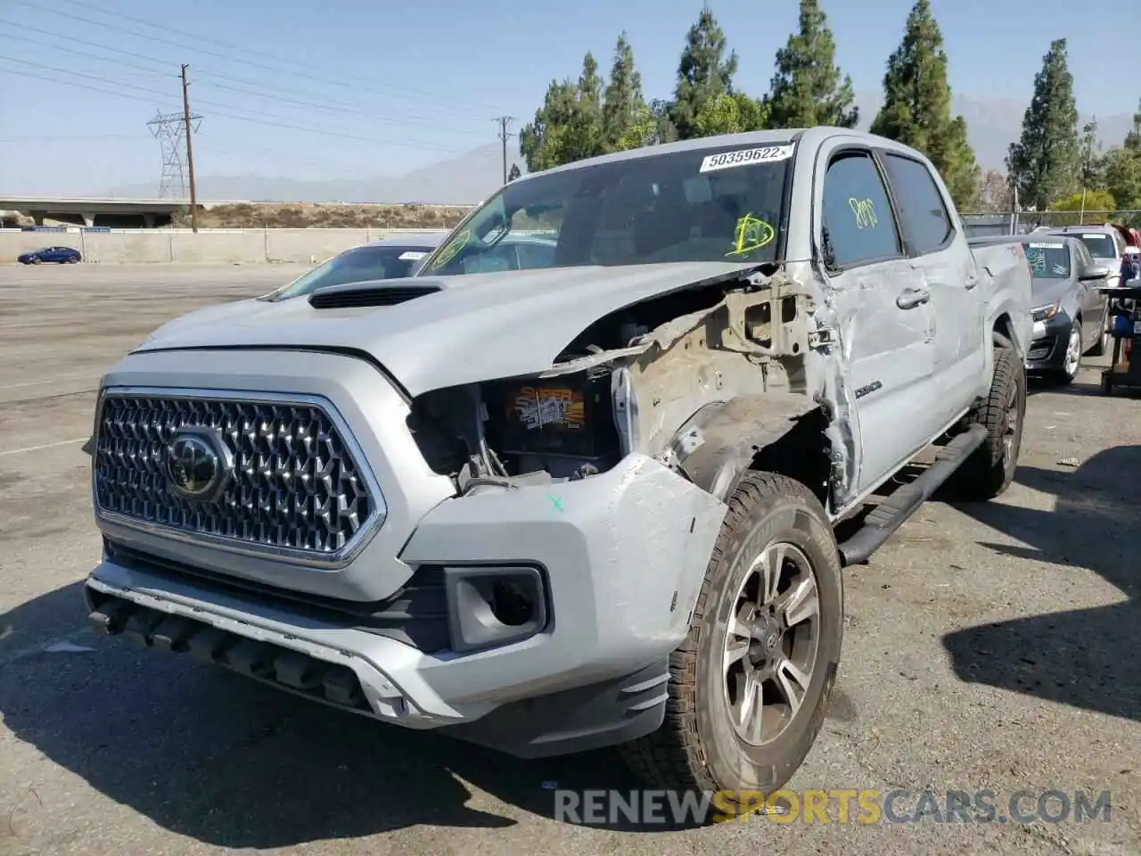 2 Photograph of a damaged car 3TMCZ5AN9KM209103 TOYOTA TACOMA 2019