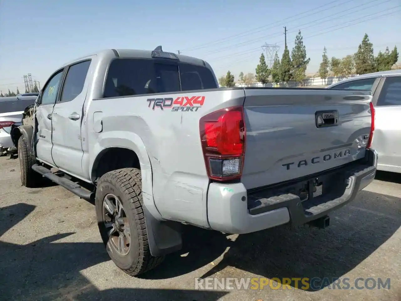 3 Photograph of a damaged car 3TMCZ5AN9KM209103 TOYOTA TACOMA 2019