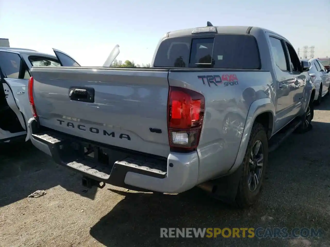 4 Photograph of a damaged car 3TMCZ5AN9KM209103 TOYOTA TACOMA 2019