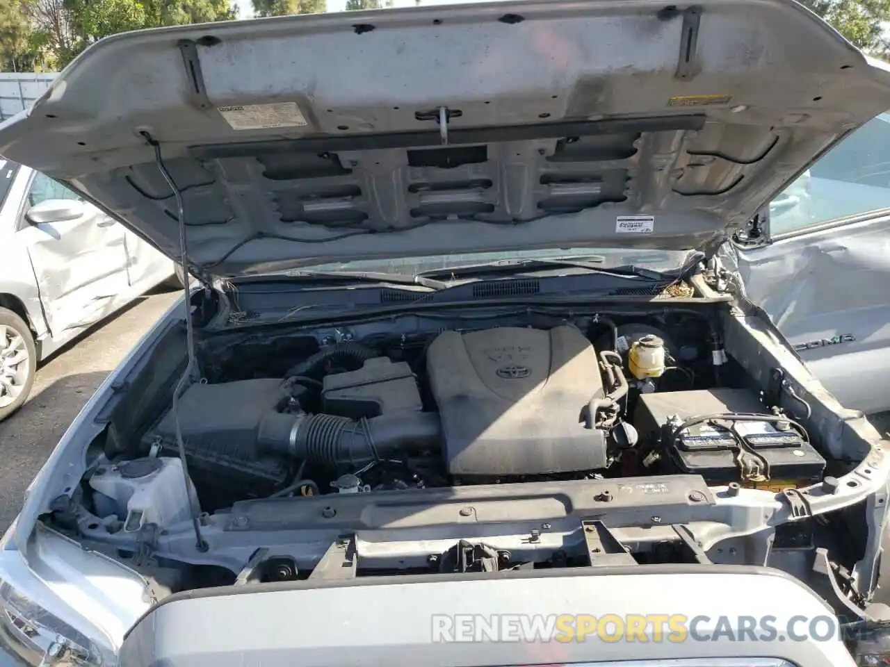 7 Photograph of a damaged car 3TMCZ5AN9KM209103 TOYOTA TACOMA 2019