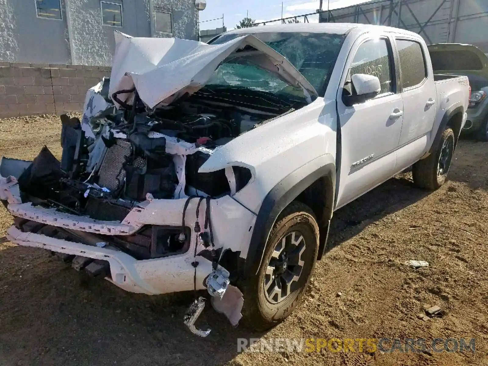 2 Photograph of a damaged car 3TMCZ5AN9KM211143 TOYOTA TACOMA 2019