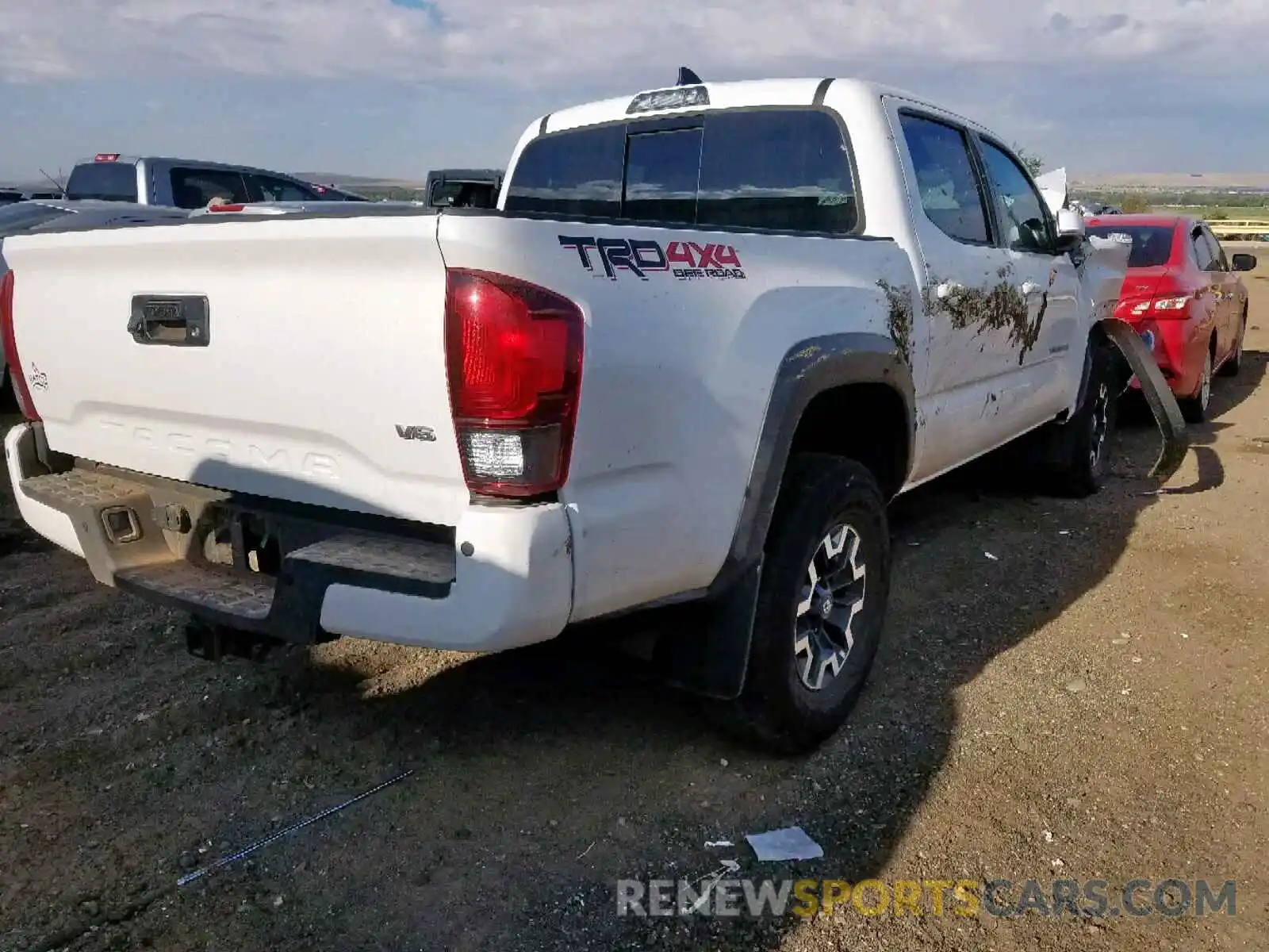 4 Photograph of a damaged car 3TMCZ5AN9KM211143 TOYOTA TACOMA 2019