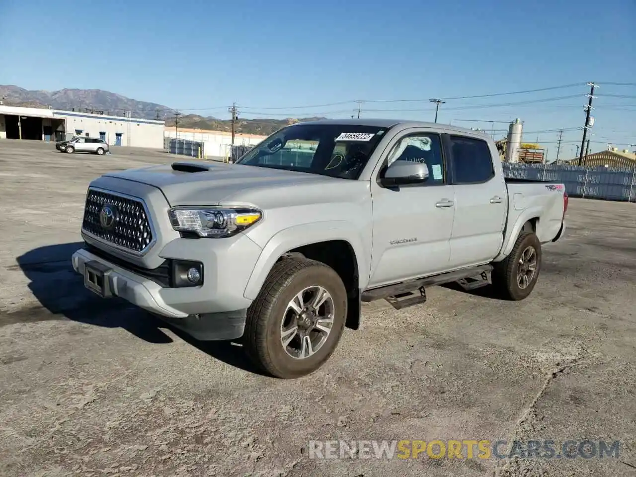 2 Photograph of a damaged car 3TMCZ5AN9KM211756 TOYOTA TACOMA 2019