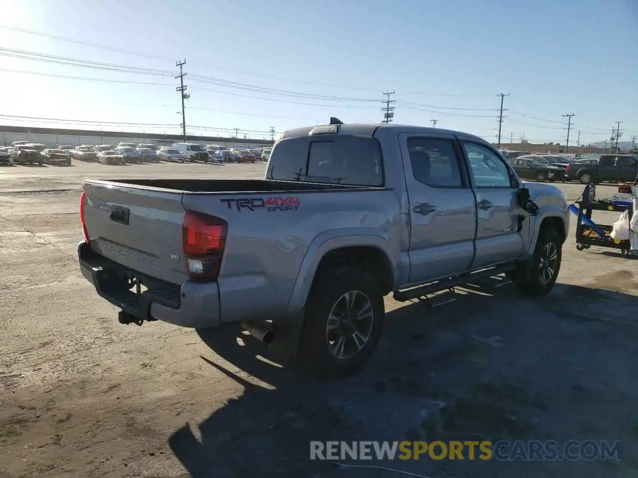 4 Photograph of a damaged car 3TMCZ5AN9KM211756 TOYOTA TACOMA 2019