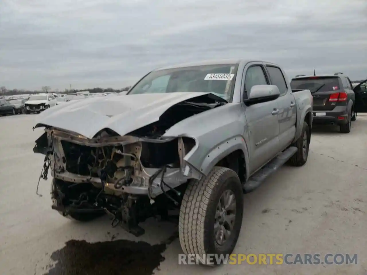 2 Photograph of a damaged car 3TMCZ5AN9KM211983 TOYOTA TACOMA 2019