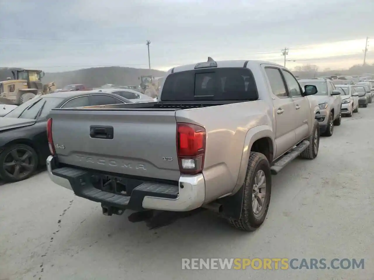 4 Photograph of a damaged car 3TMCZ5AN9KM211983 TOYOTA TACOMA 2019