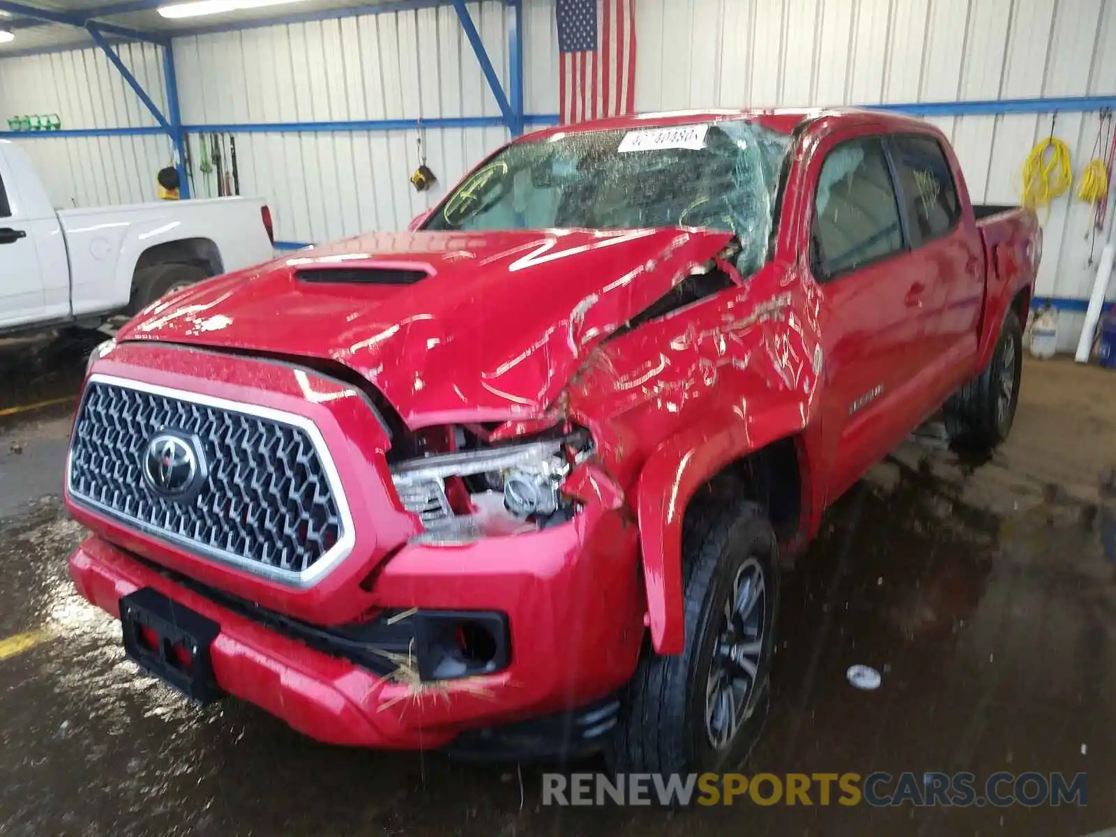 2 Photograph of a damaged car 3TMCZ5AN9KM215399 TOYOTA TACOMA 2019