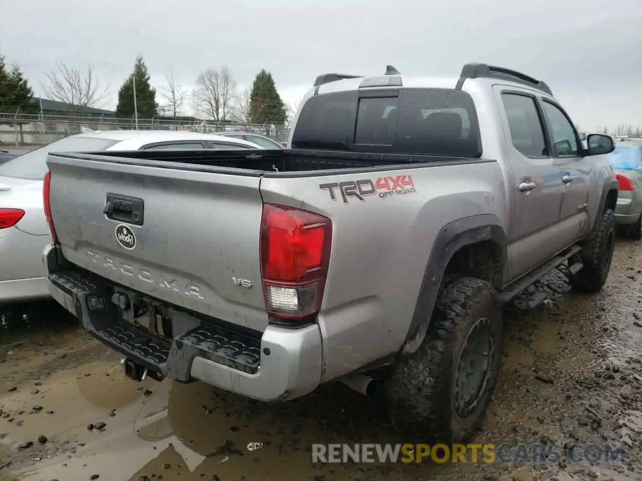 4 Photograph of a damaged car 3TMCZ5AN9KM215905 TOYOTA TACOMA 2019