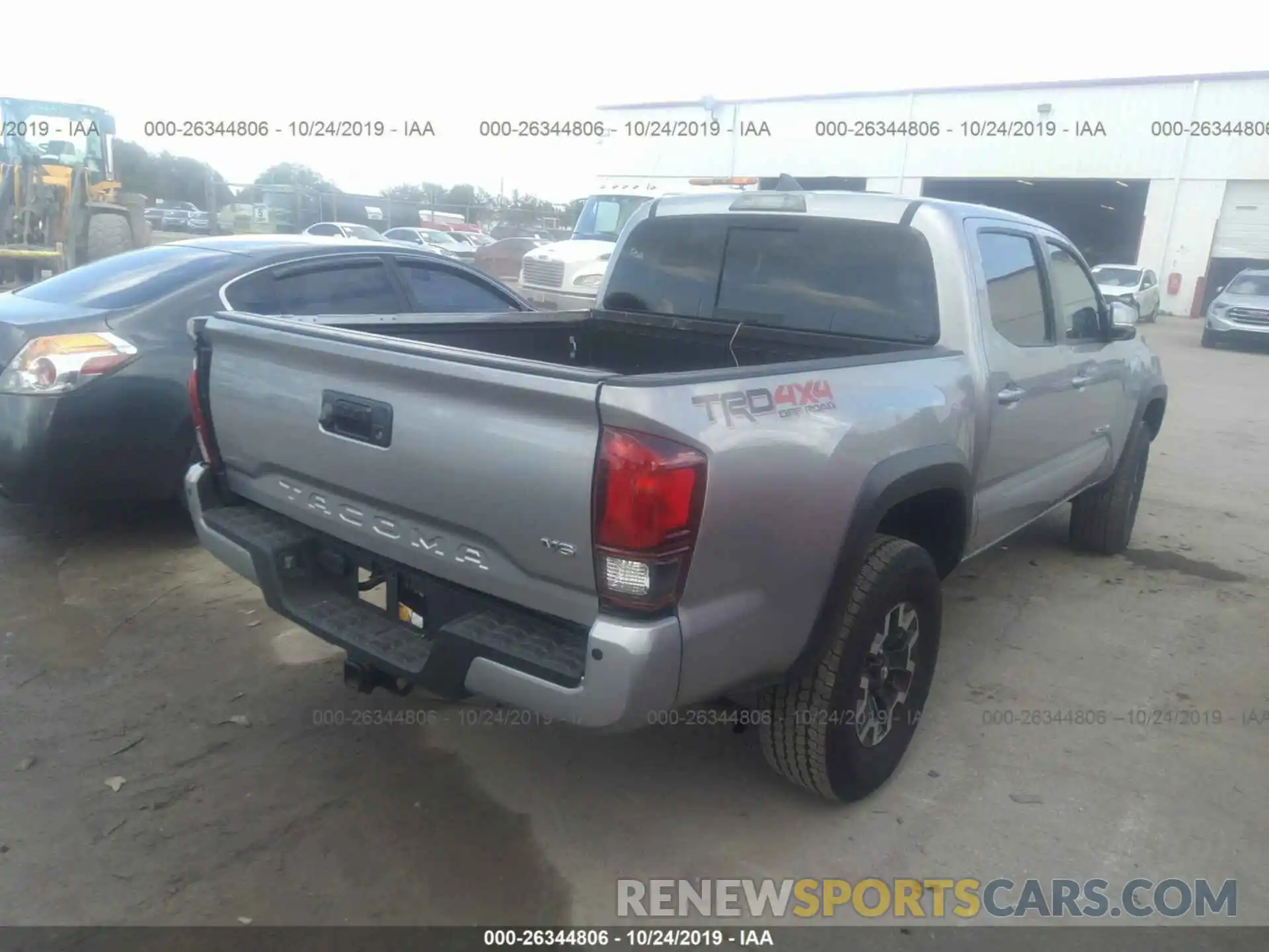 4 Photograph of a damaged car 3TMCZ5AN9KM222580 TOYOTA TACOMA 2019