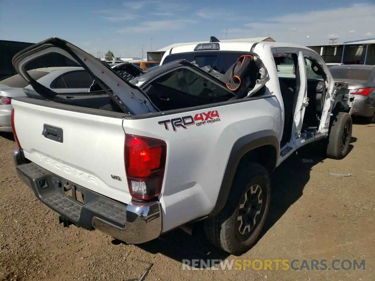 4 Photograph of a damaged car 3TMCZ5AN9KM224409 TOYOTA TACOMA 2019