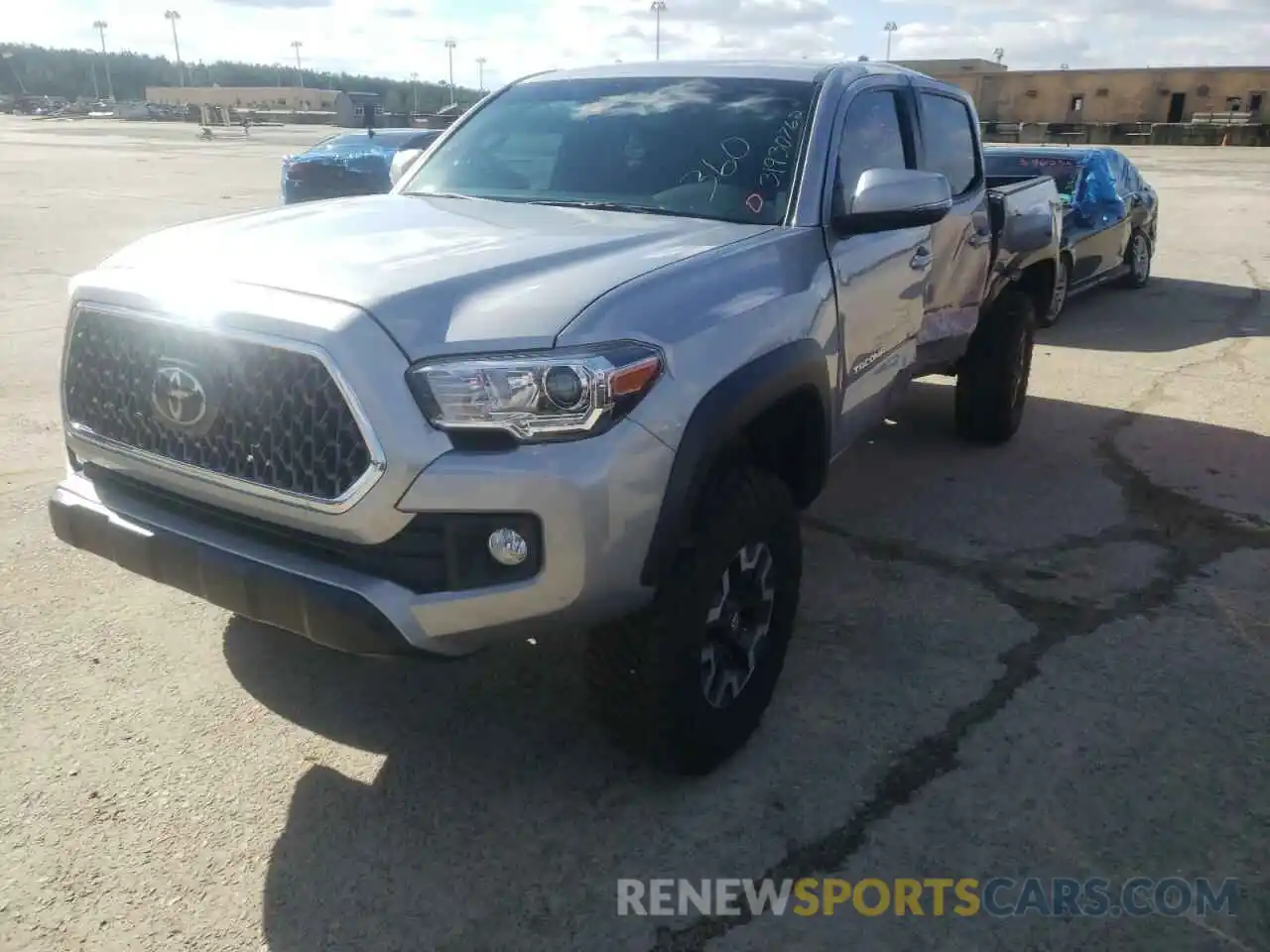 2 Photograph of a damaged car 3TMCZ5AN9KM224989 TOYOTA TACOMA 2019