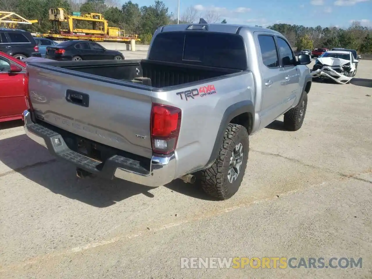 4 Photograph of a damaged car 3TMCZ5AN9KM224989 TOYOTA TACOMA 2019