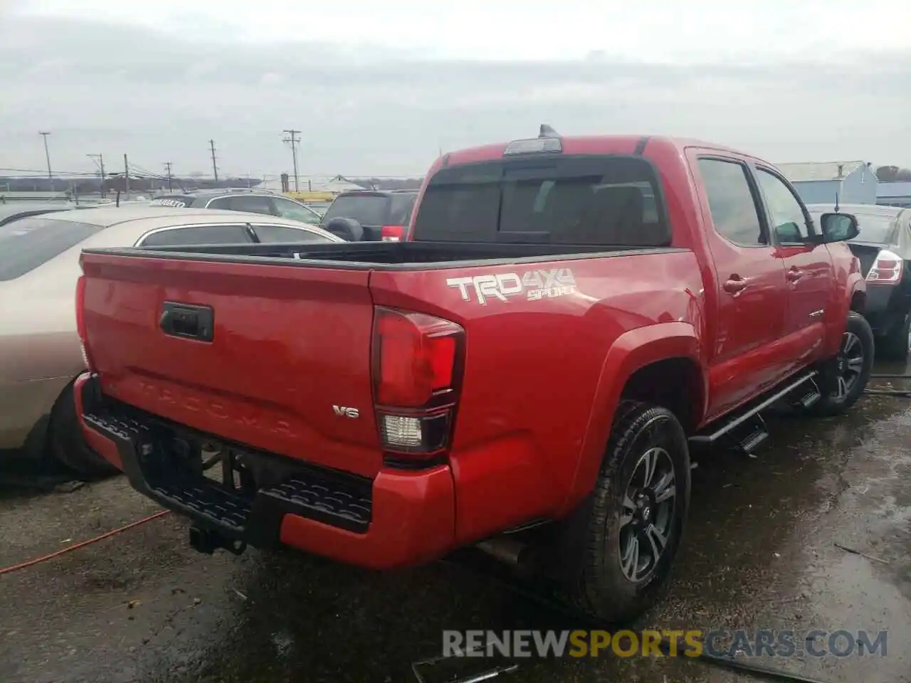 4 Photograph of a damaged car 3TMCZ5AN9KM227889 TOYOTA TACOMA 2019