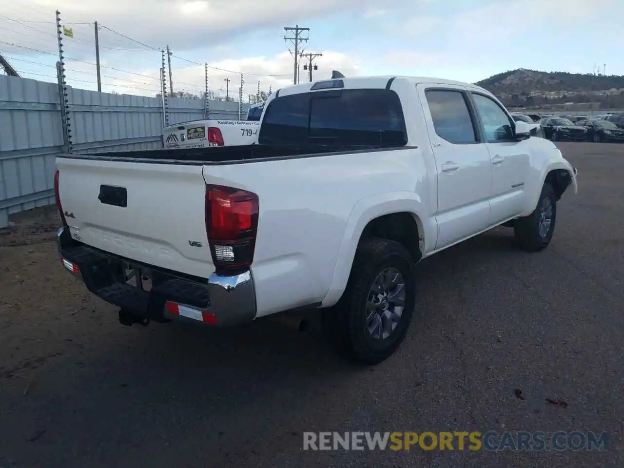 4 Photograph of a damaged car 3TMCZ5AN9KM230128 TOYOTA TACOMA 2019