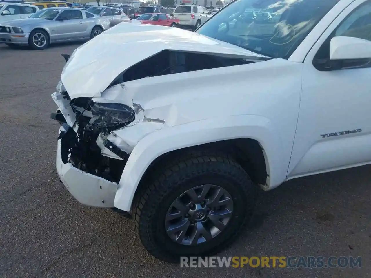 9 Photograph of a damaged car 3TMCZ5AN9KM230128 TOYOTA TACOMA 2019