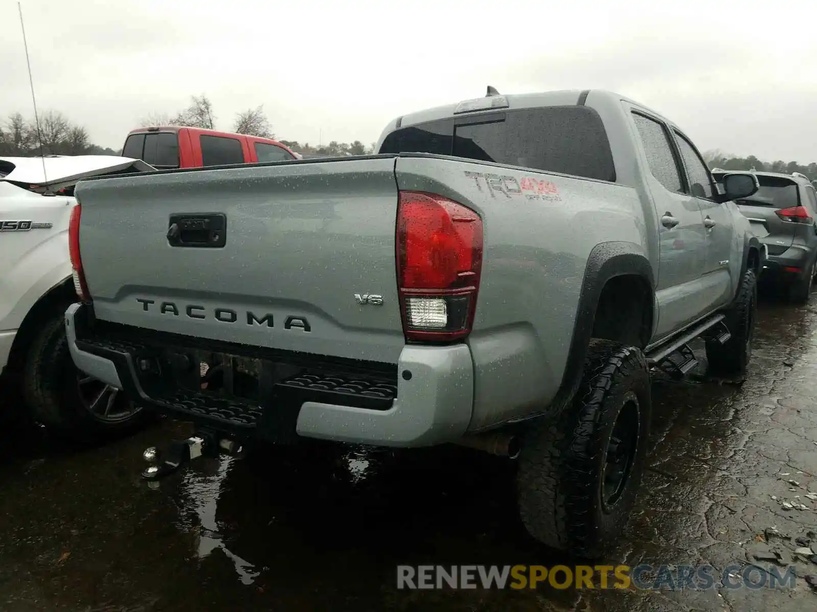 4 Photograph of a damaged car 3TMCZ5AN9KM230744 TOYOTA TACOMA 2019