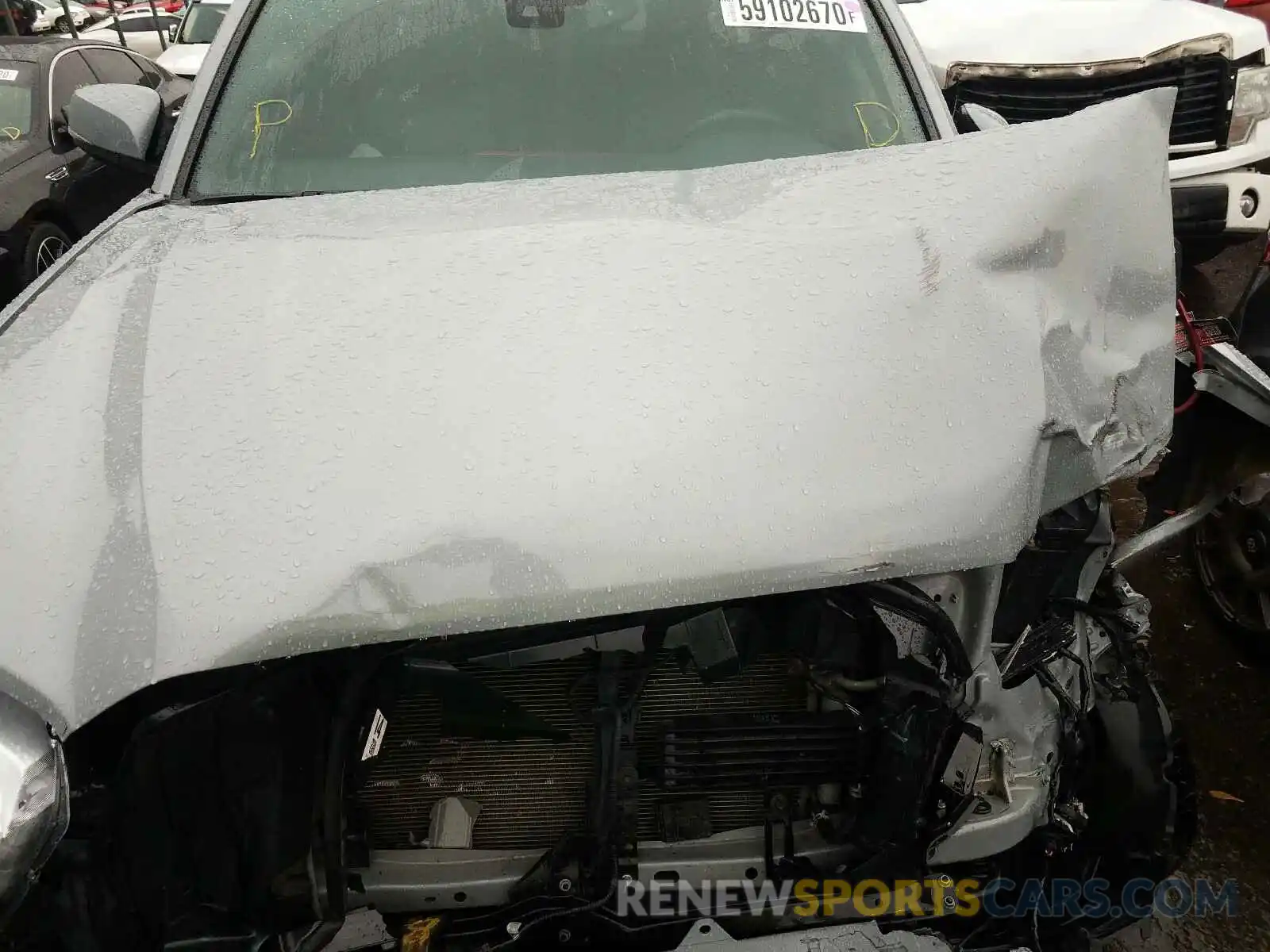 7 Photograph of a damaged car 3TMCZ5AN9KM230744 TOYOTA TACOMA 2019