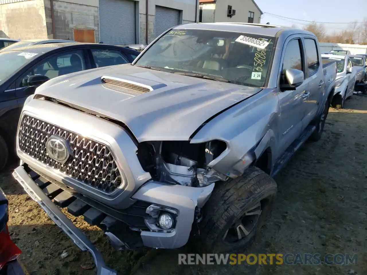 2 Photograph of a damaged car 3TMCZ5AN9KM231456 TOYOTA TACOMA 2019