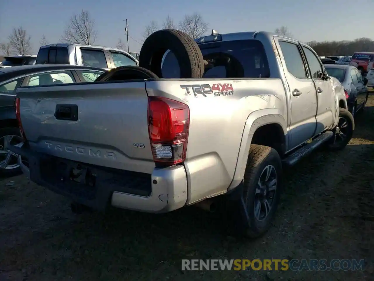 4 Photograph of a damaged car 3TMCZ5AN9KM231456 TOYOTA TACOMA 2019