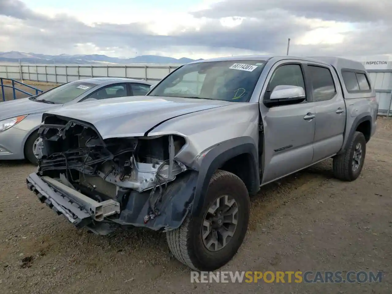 2 Photograph of a damaged car 3TMCZ5AN9KM231568 TOYOTA TACOMA 2019