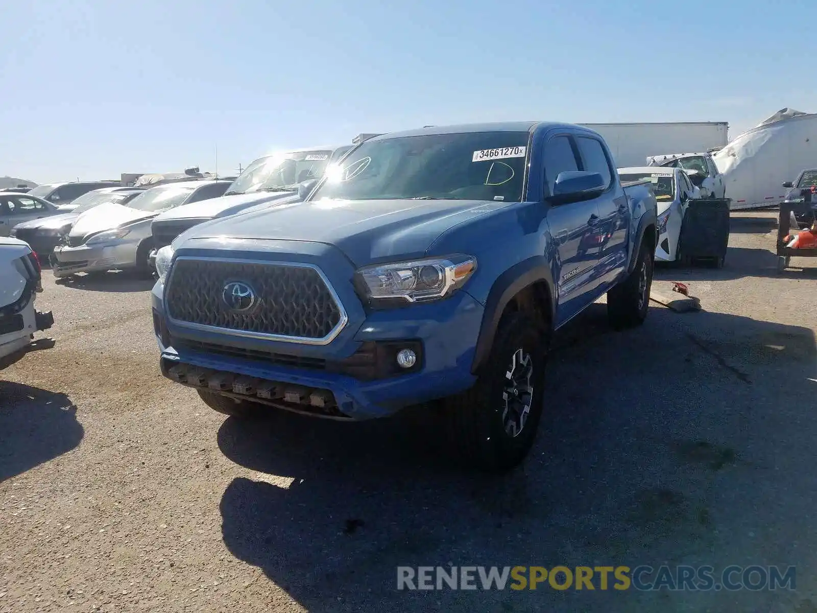 2 Photograph of a damaged car 3TMCZ5AN9KM233059 TOYOTA TACOMA 2019