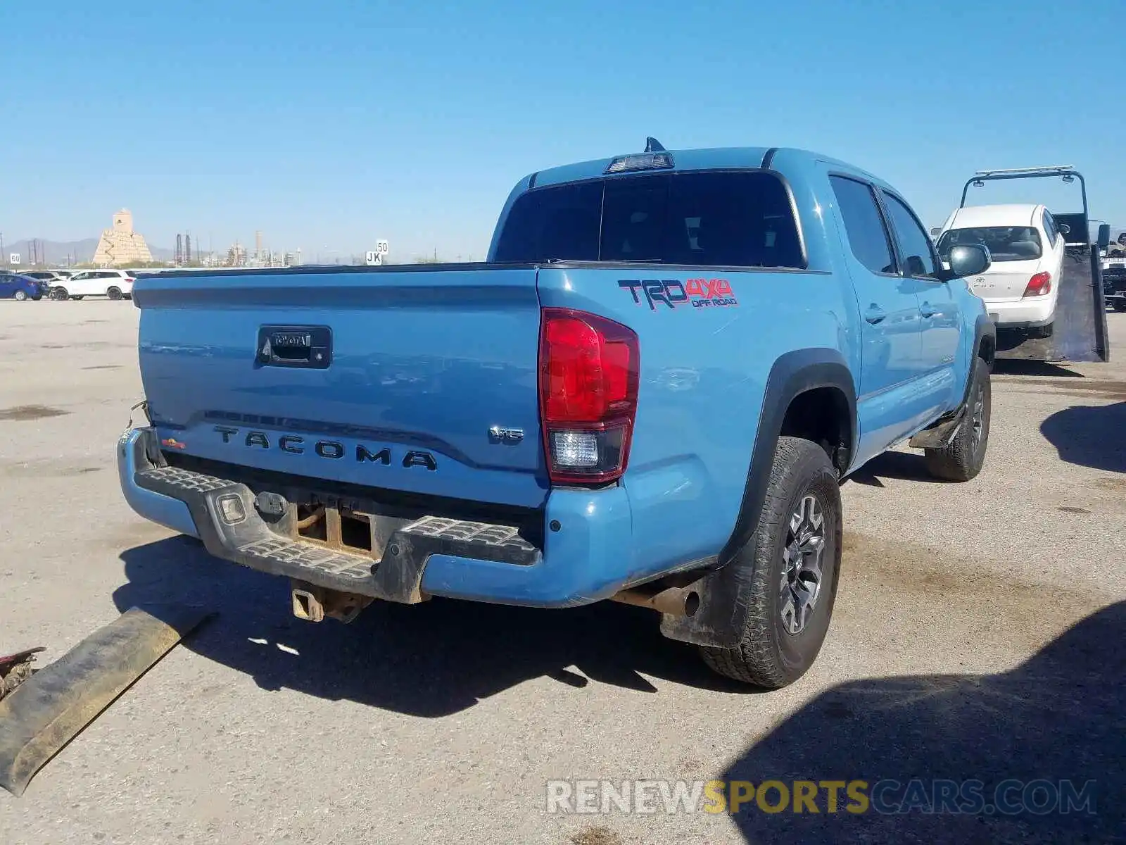 4 Photograph of a damaged car 3TMCZ5AN9KM233059 TOYOTA TACOMA 2019