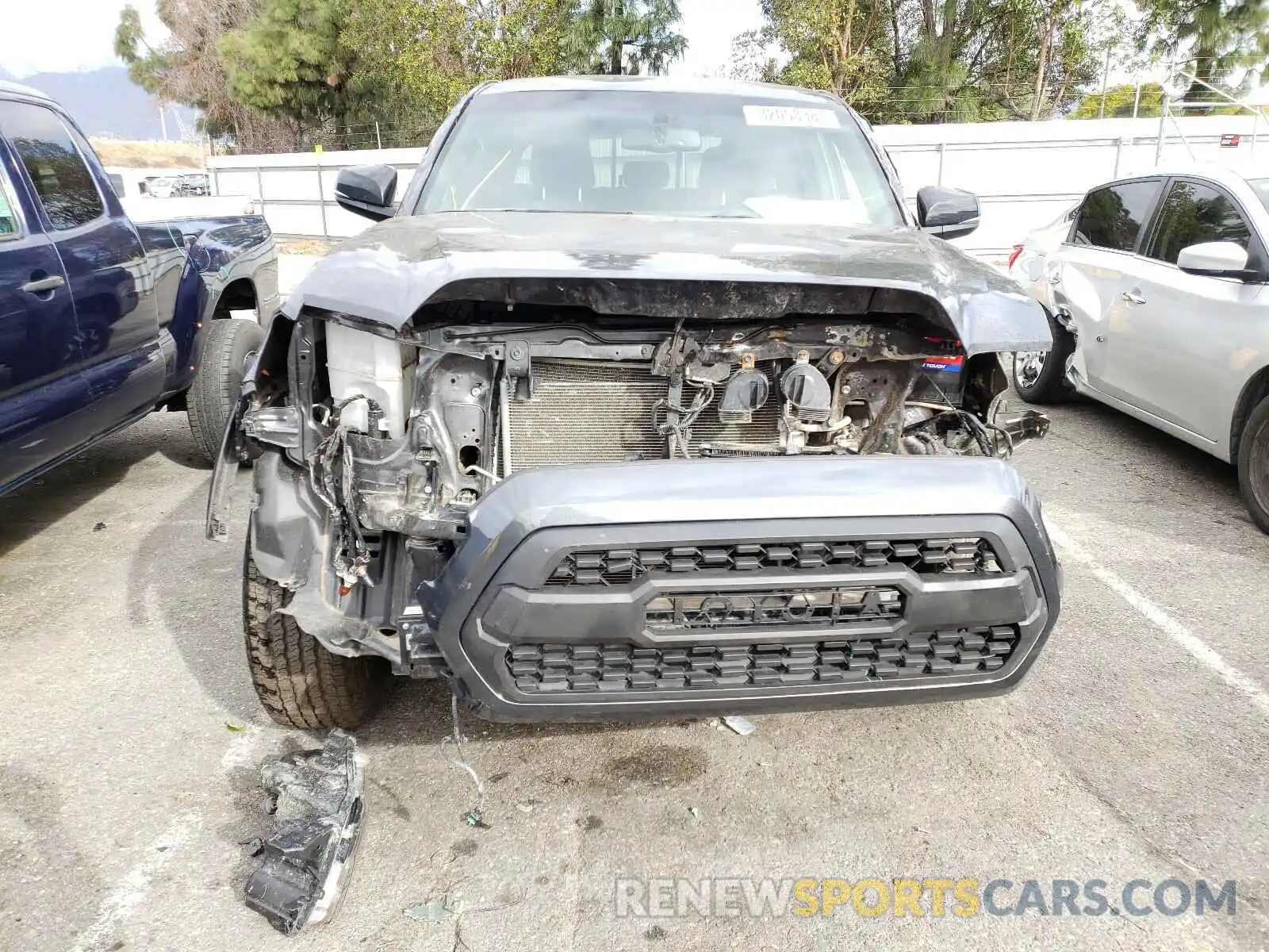 9 Photograph of a damaged car 3TMCZ5AN9KM237628 TOYOTA TACOMA 2019