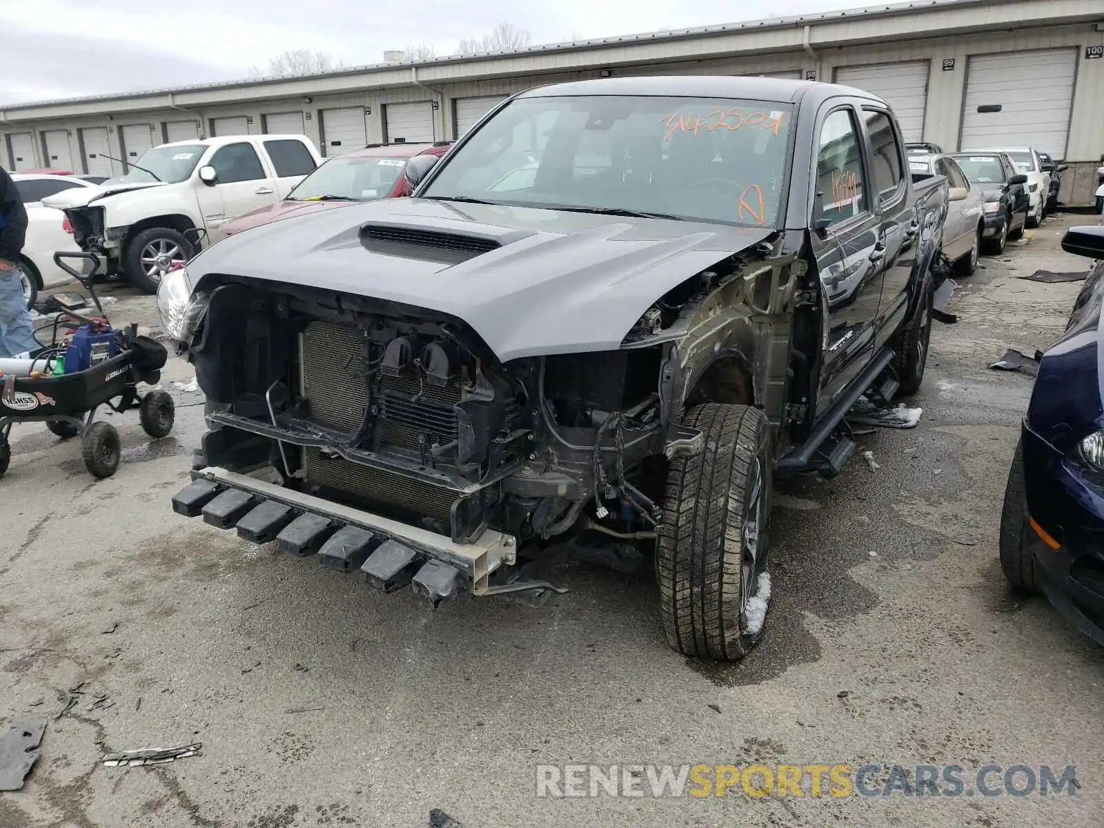 2 Photograph of a damaged car 3TMCZ5AN9KM238388 TOYOTA TACOMA 2019