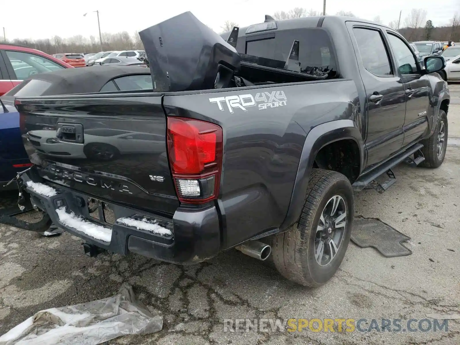 4 Photograph of a damaged car 3TMCZ5AN9KM238388 TOYOTA TACOMA 2019