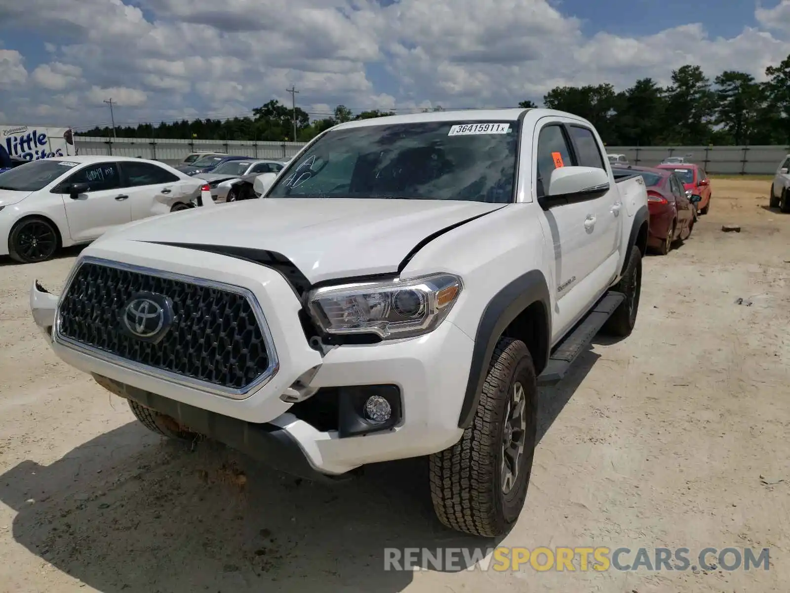 2 Photograph of a damaged car 3TMCZ5AN9KM238620 TOYOTA TACOMA 2019