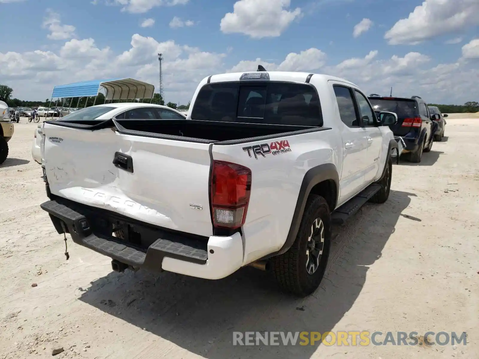 4 Photograph of a damaged car 3TMCZ5AN9KM238620 TOYOTA TACOMA 2019