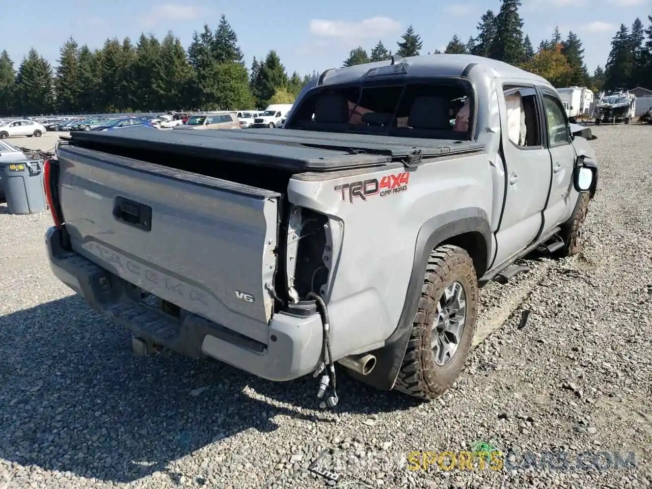 4 Photograph of a damaged car 3TMCZ5AN9KM240710 TOYOTA TACOMA 2019