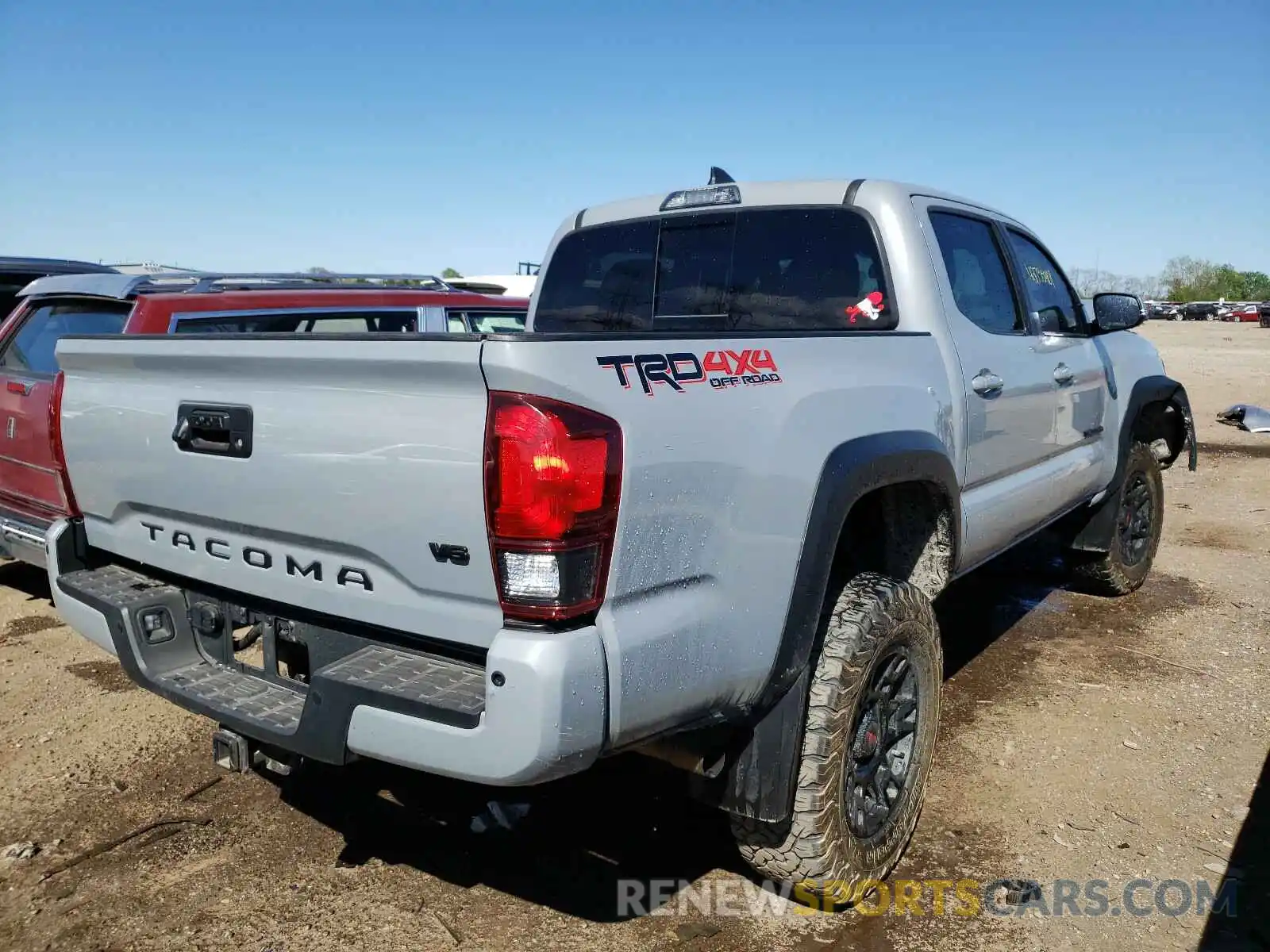 4 Photograph of a damaged car 3TMCZ5AN9KM241095 TOYOTA TACOMA 2019