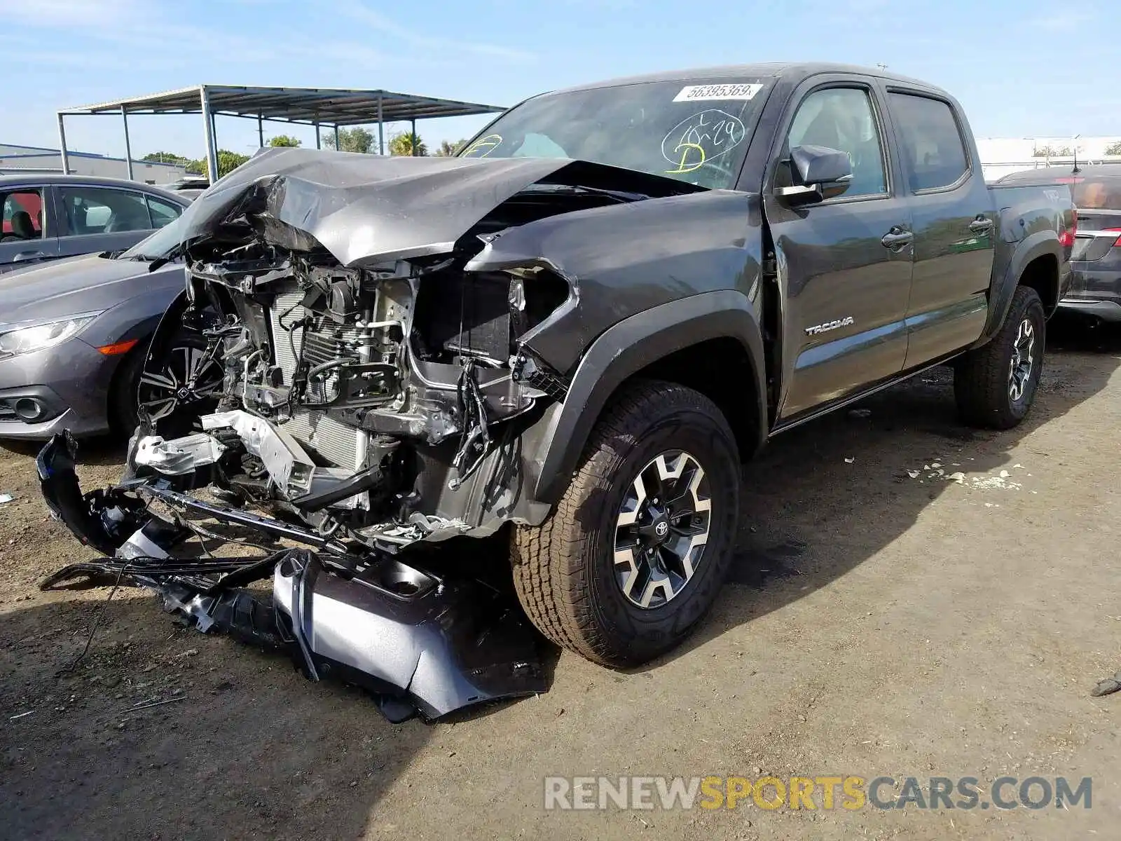 2 Photograph of a damaged car 3TMCZ5AN9KM243624 TOYOTA TACOMA 2019