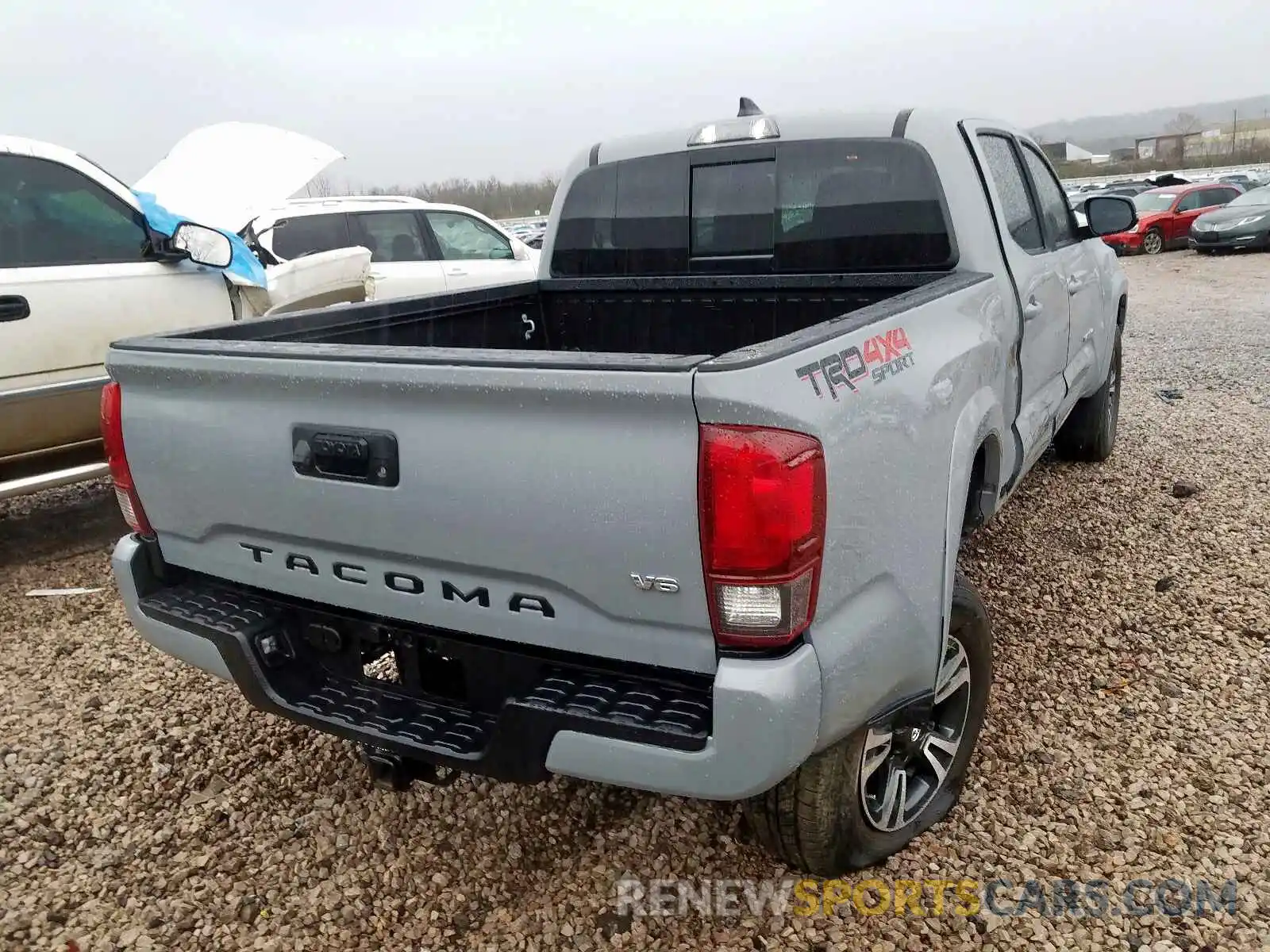 4 Photograph of a damaged car 3TMCZ5AN9KM244319 TOYOTA TACOMA 2019