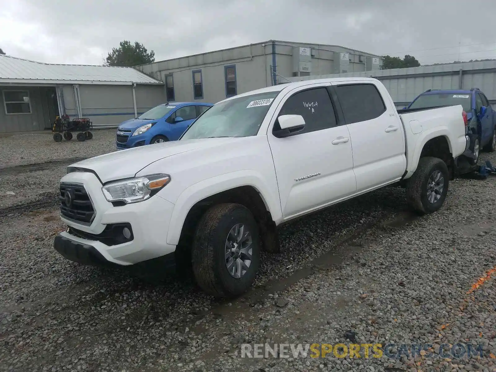 2 Photograph of a damaged car 3TMCZ5AN9KM245082 TOYOTA TACOMA 2019