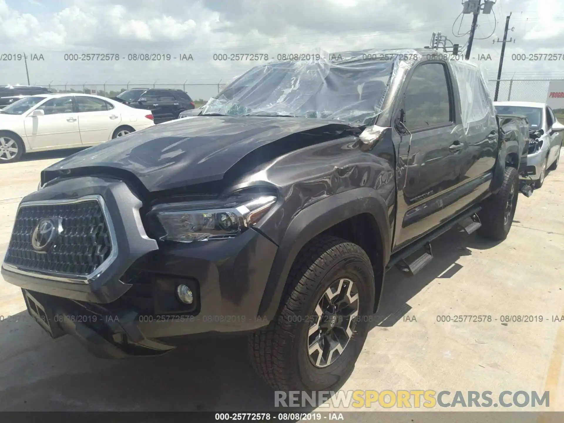 2 Photograph of a damaged car 3TMCZ5AN9KM245731 TOYOTA TACOMA 2019