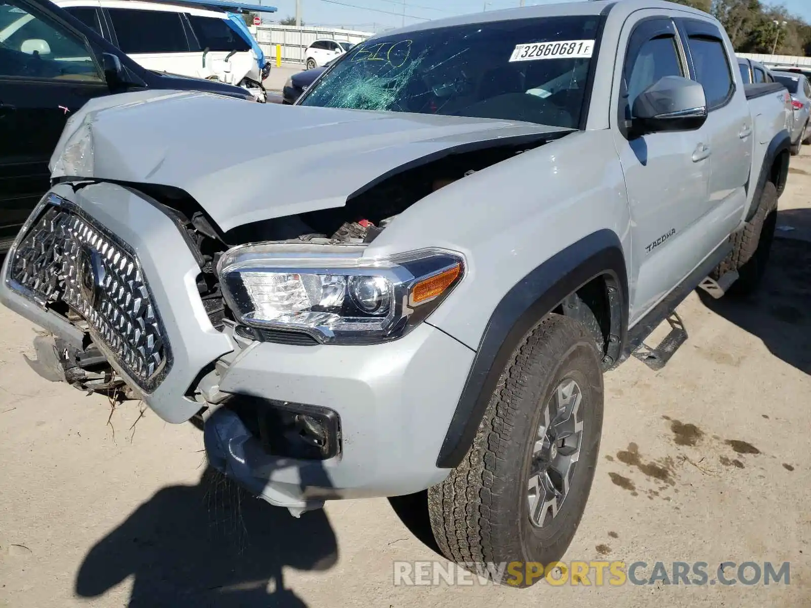 2 Photograph of a damaged car 3TMCZ5AN9KM245924 TOYOTA TACOMA 2019