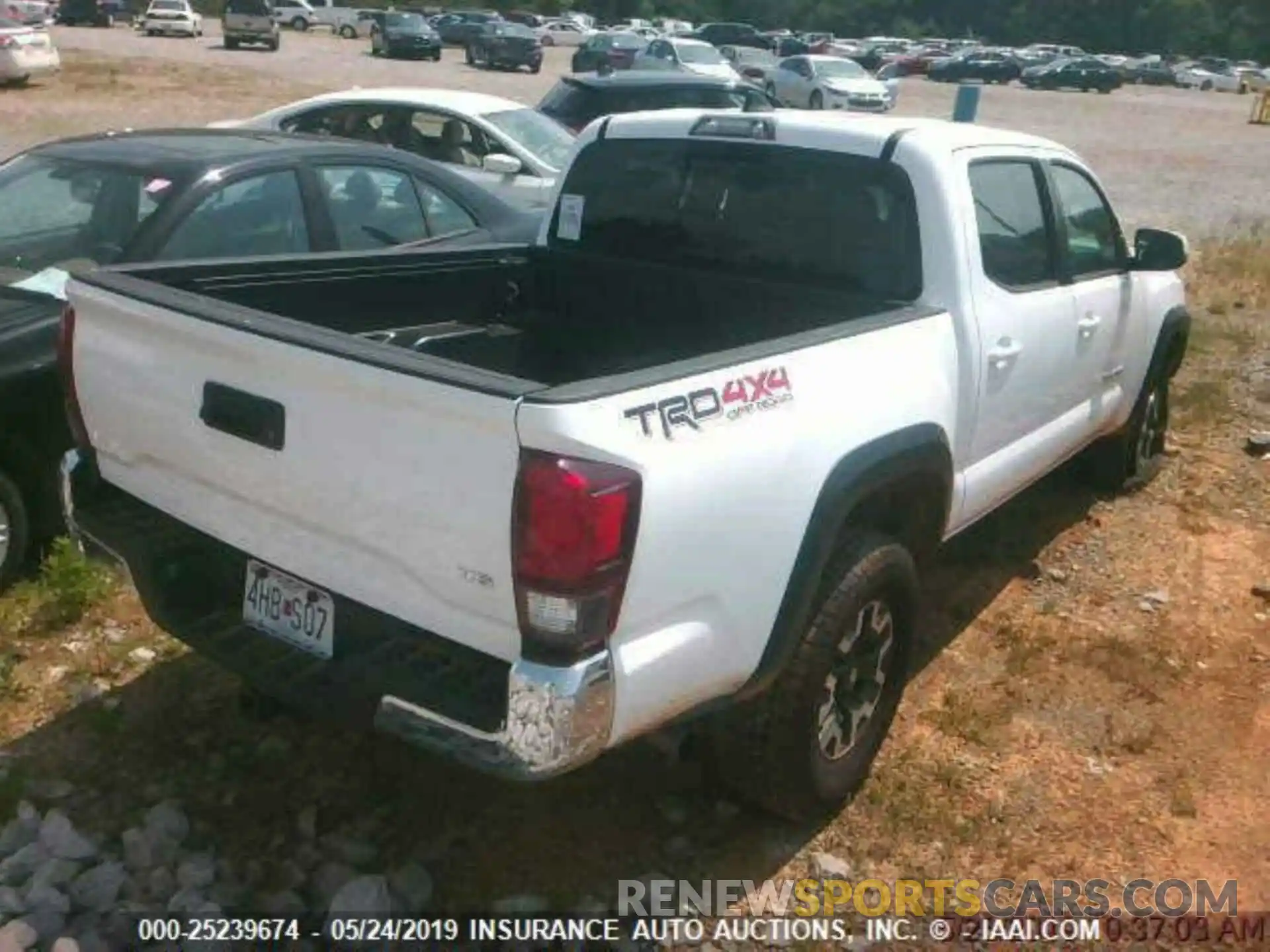 2 Photograph of a damaged car 3TMCZ5AN9KM247124 TOYOTA TACOMA 2019