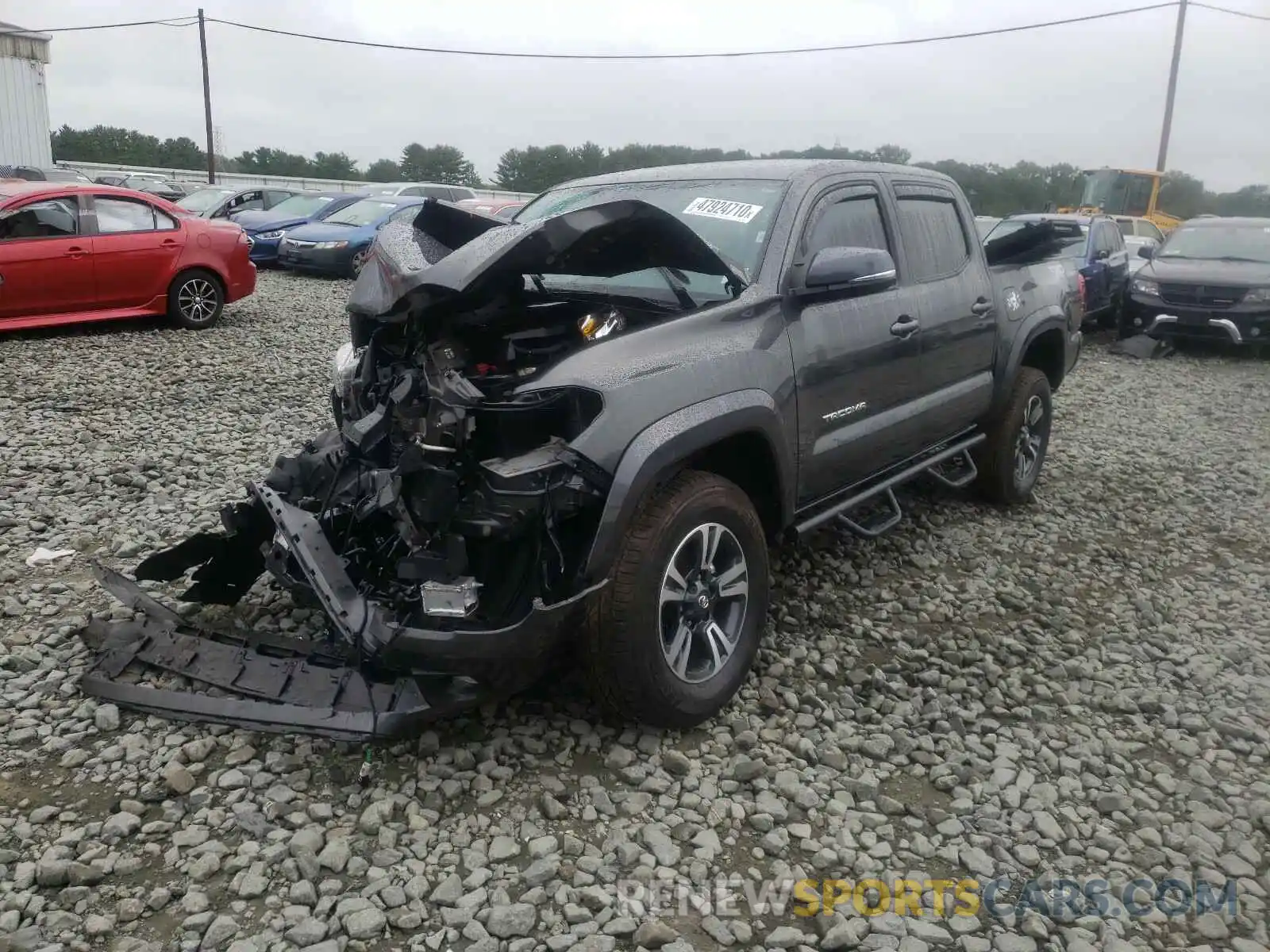 2 Photograph of a damaged car 3TMCZ5AN9KM251075 TOYOTA TACOMA 2019