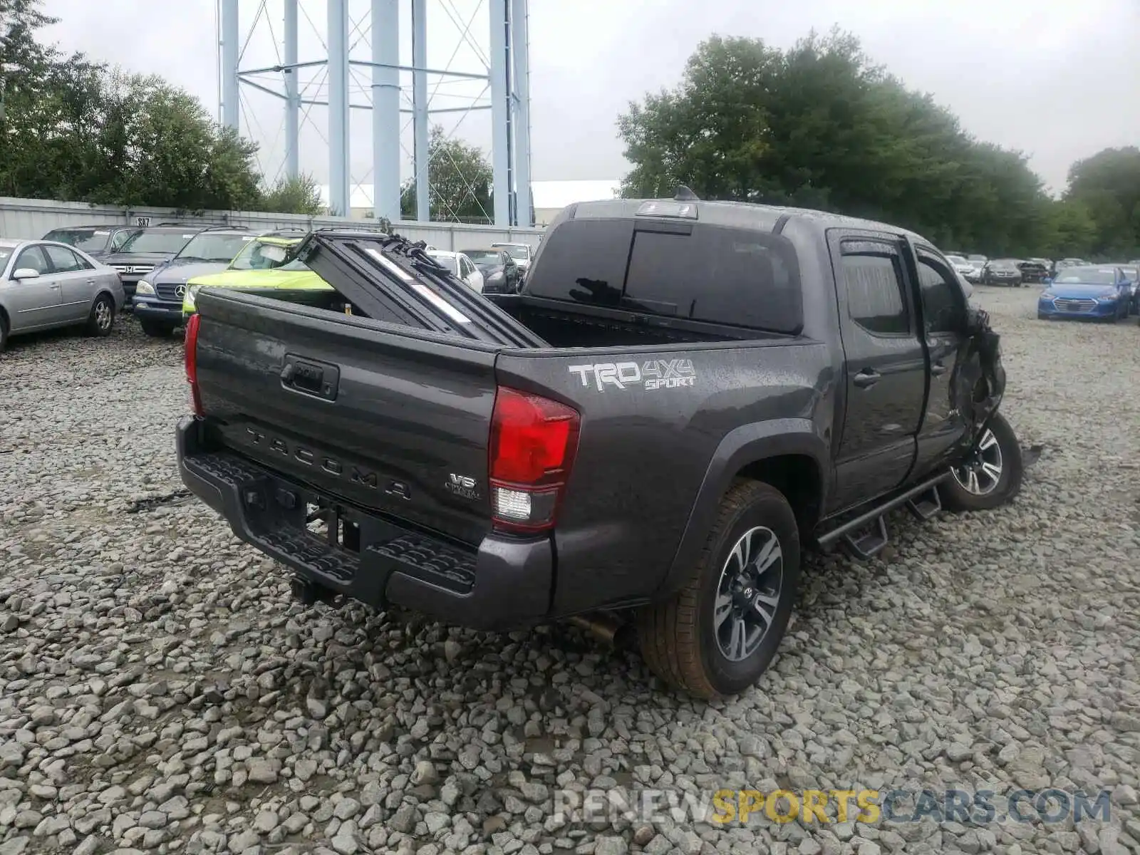 4 Photograph of a damaged car 3TMCZ5AN9KM251075 TOYOTA TACOMA 2019