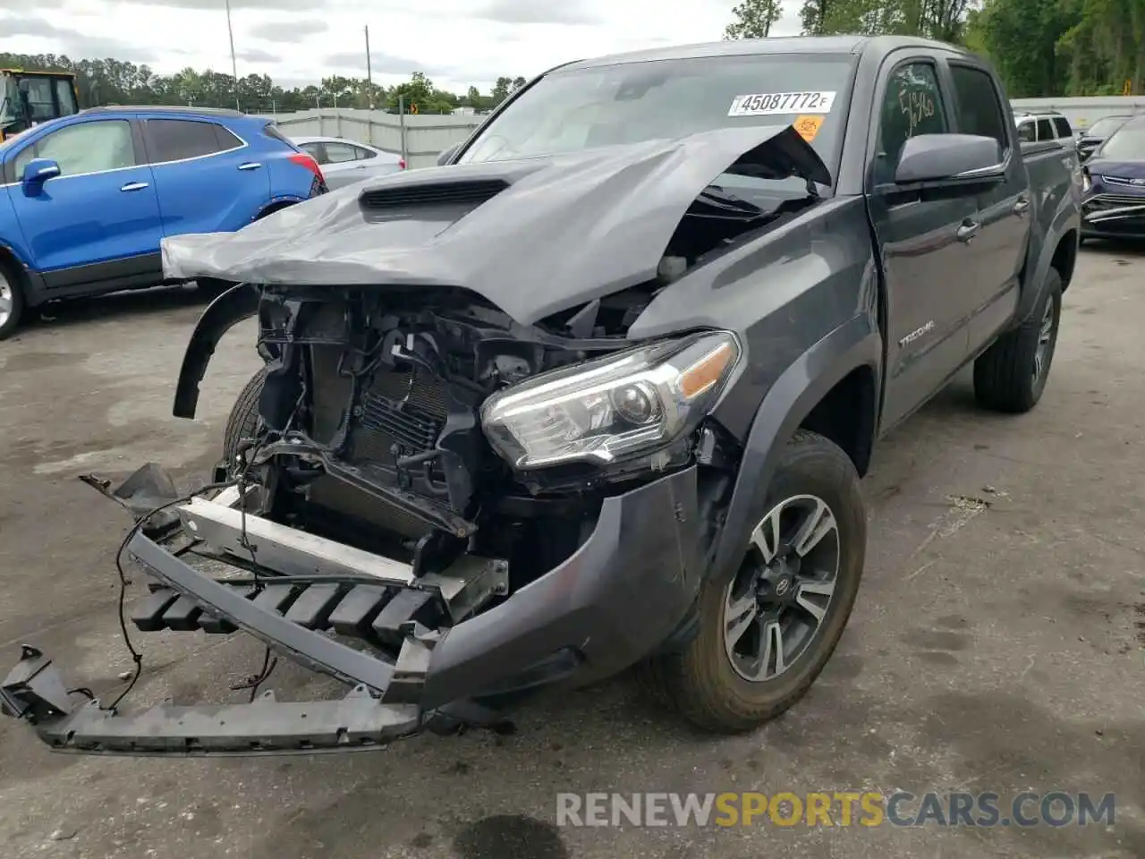 2 Photograph of a damaged car 3TMCZ5AN9KM252128 TOYOTA TACOMA 2019