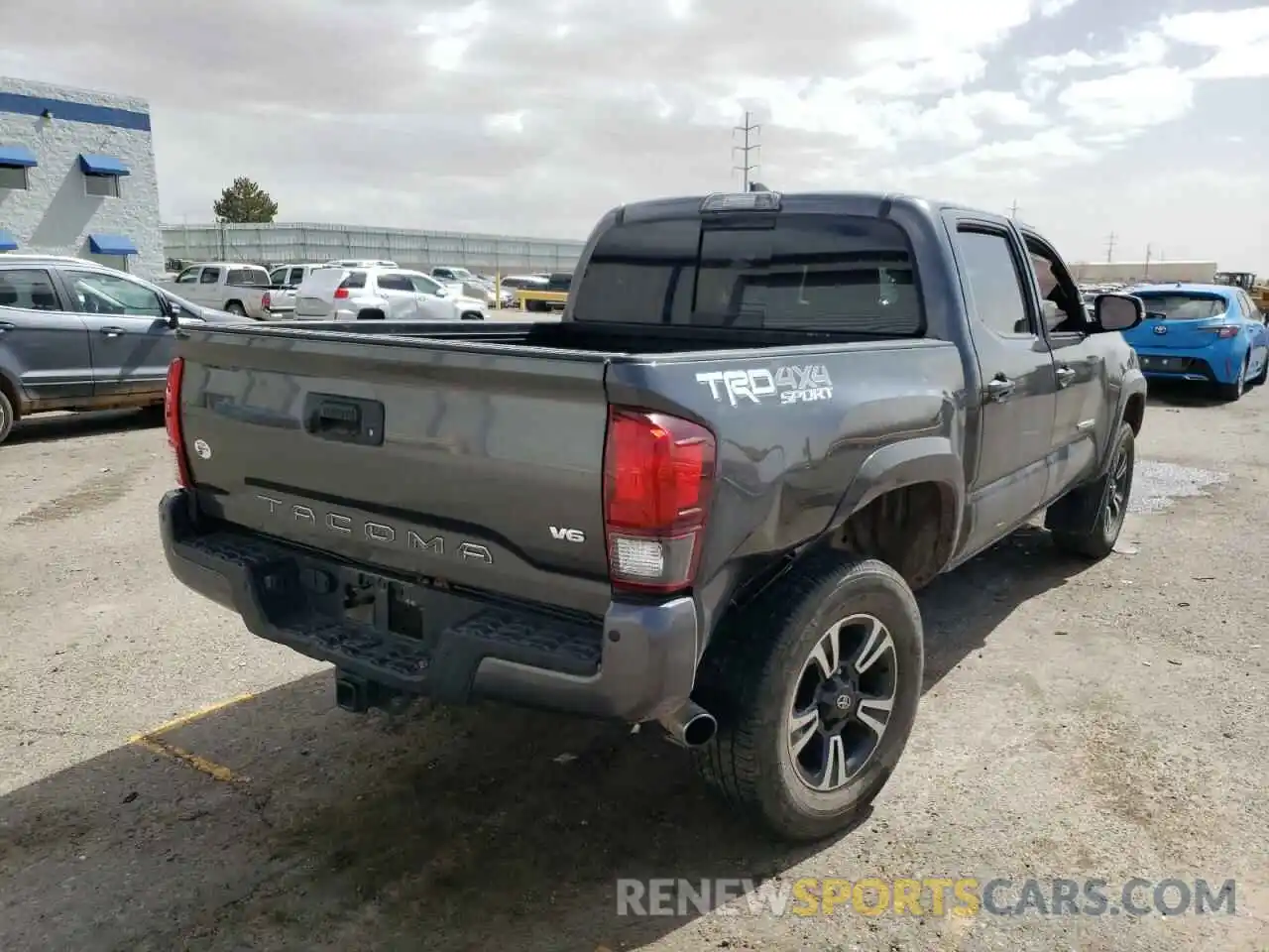 4 Photograph of a damaged car 3TMCZ5AN9KM254333 TOYOTA TACOMA 2019