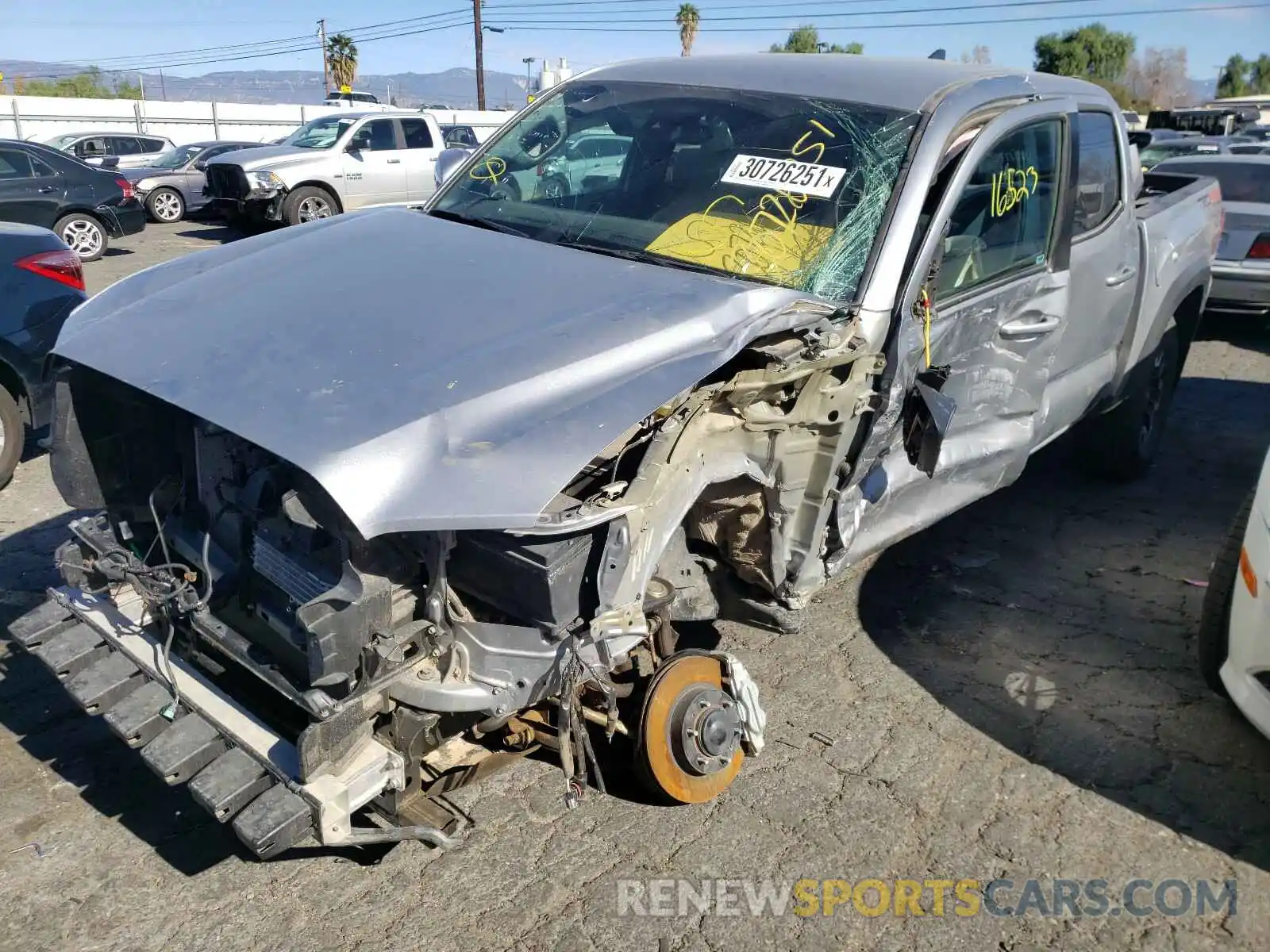 2 Photograph of a damaged car 3TMCZ5AN9KM258110 TOYOTA TACOMA 2019