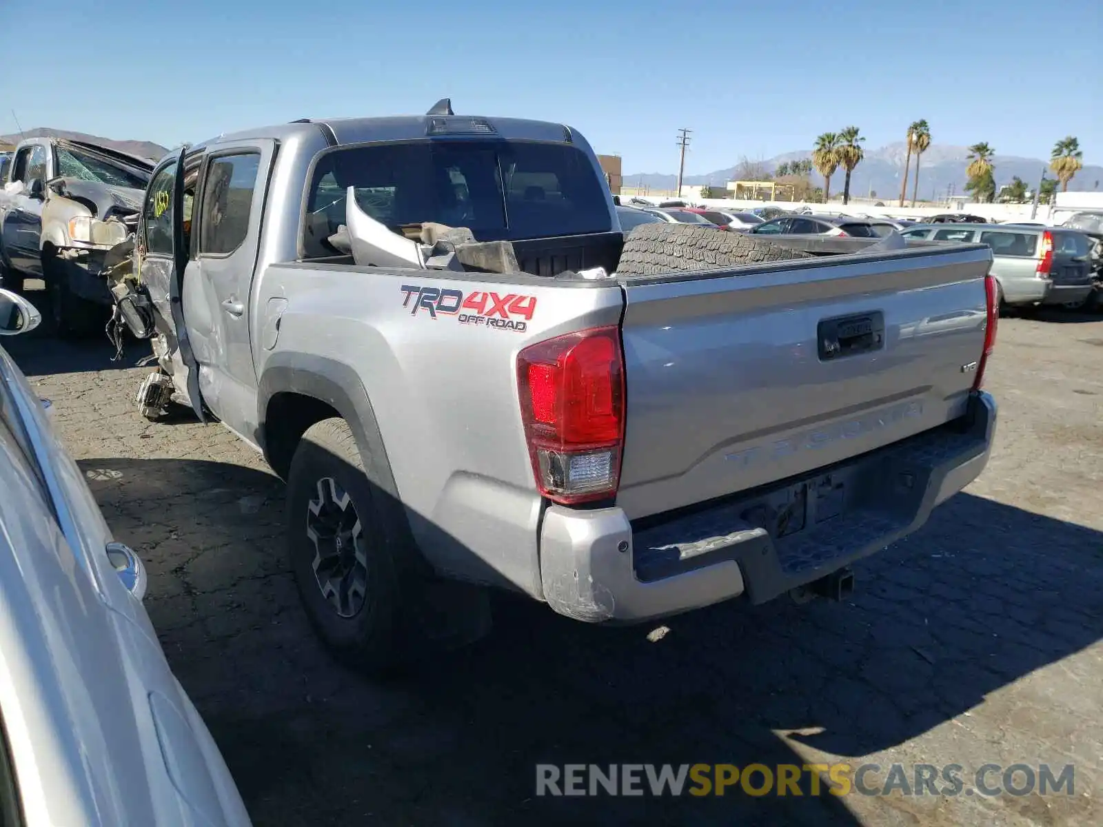 3 Photograph of a damaged car 3TMCZ5AN9KM258110 TOYOTA TACOMA 2019