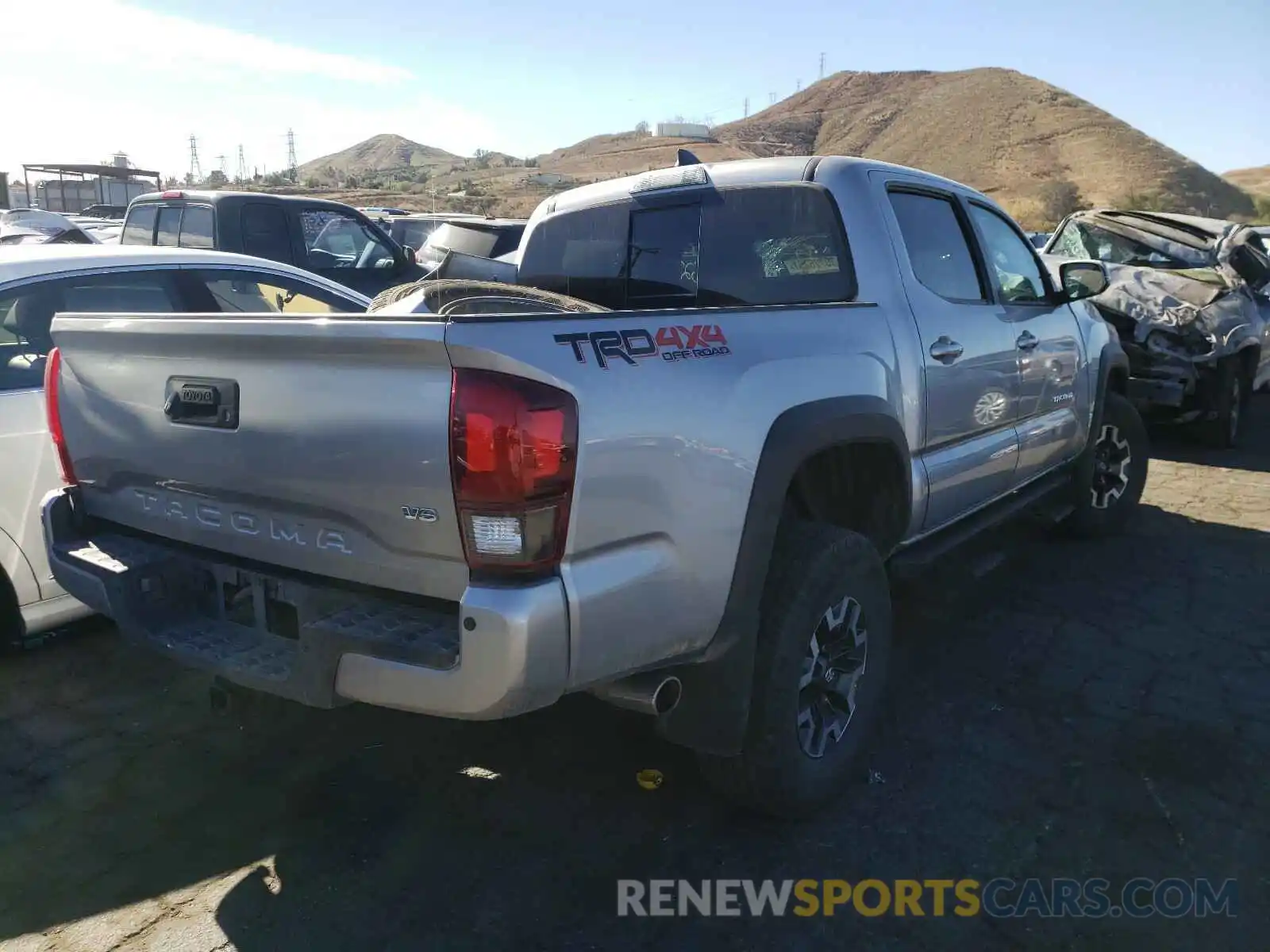 4 Photograph of a damaged car 3TMCZ5AN9KM258110 TOYOTA TACOMA 2019